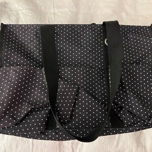 EUC Thirty-One zipped tote in black with white polka dots and 7 outside pockets